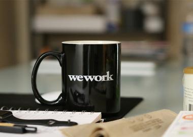 close-up of a mug on a messy desk